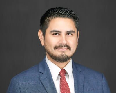Managing Attorney - Carlos Gomez